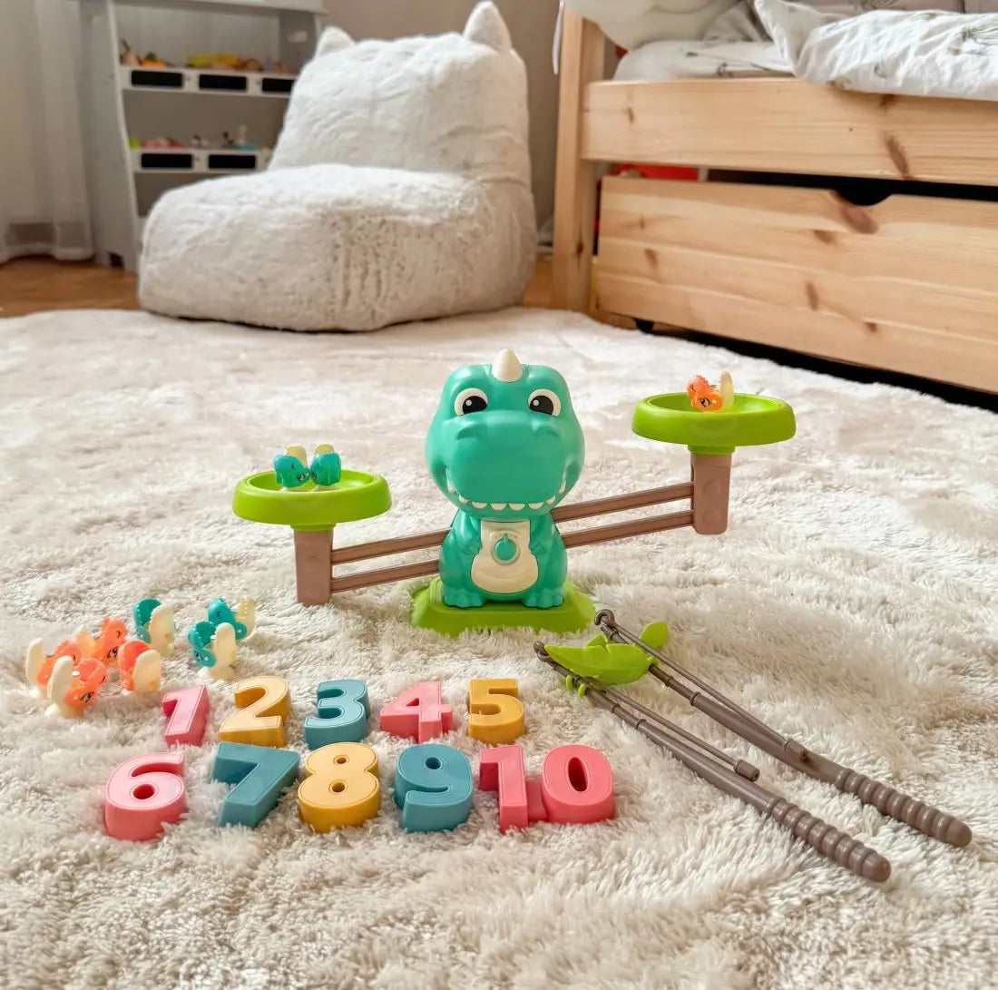 Balanță Dinozaur Woopie cu numerele 1-10, figurine și accesorii pentru joacă educativă.