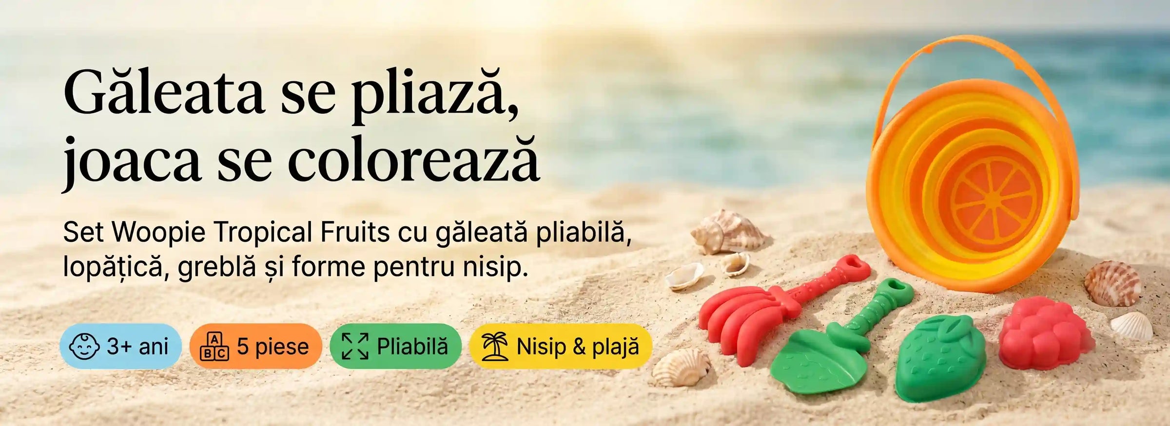Banner AryaJoy pentru setul Woopie Tropical Fruits cu găleată pliabilă galben-portocalie, lopățică verde, greblă roșie și forme pentru nisip.