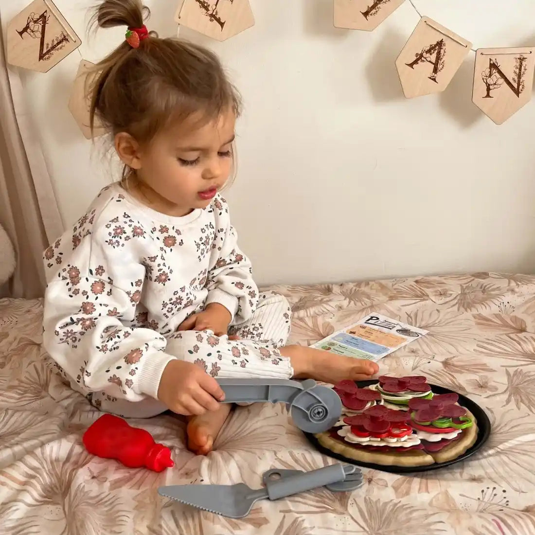 Pizza se taie, joaca prinde gust